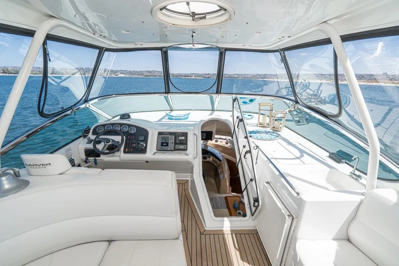 Slide: The Image of Luxurious 2003 Carver 530 Voyager Pilothouse interior with panoramic ocean view. - 31