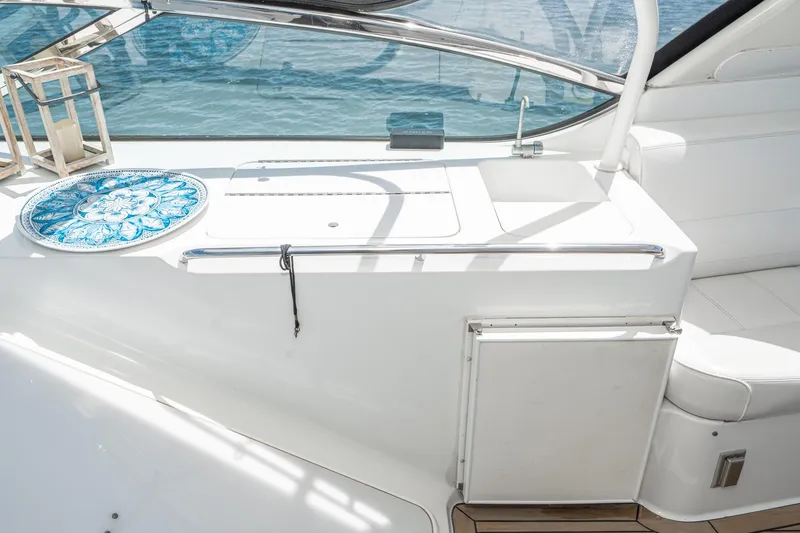 Slide: The Image of Luxurious 2003 Carver 530 Voyager Pilothouse yacht interior with elegant seating and decorative accents. - 35