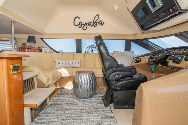 Slide: The Image of Luxurious interior of 2003 Carver 530 Voyager Pilothouse with plush seating and modern helm. - 38