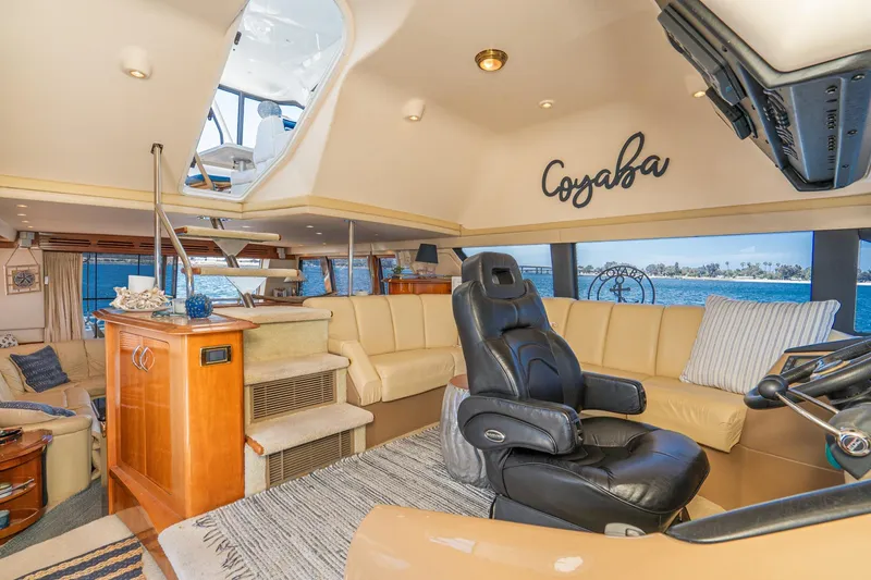 Slide: The Image of Luxurious interior of 2003 Carver 530 Voyager Pilothouse yacht with leather seating. - 39