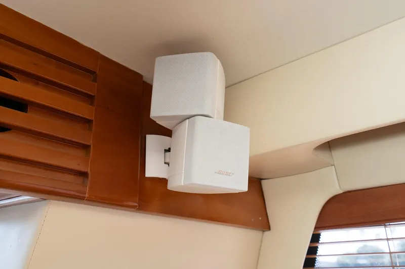 Slide: The Image of Bose speakers mounted inside a 2003 Carver 530 Voyager Pilothouse yacht. - 57