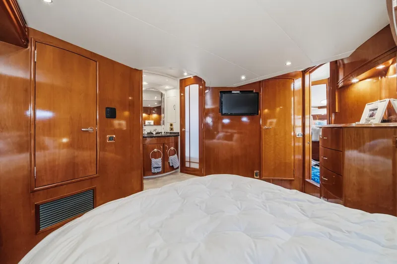 Slide: The Image of Luxurious interior of 2003 Carver 530 Voyager Pilothouse with wood paneling and modern amenities. - 58