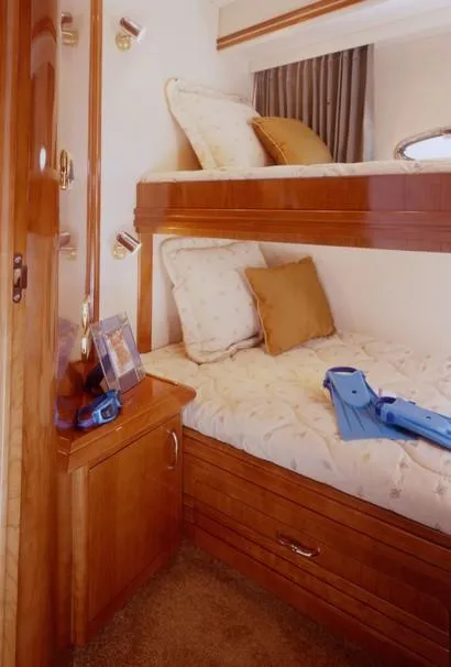 Slide: The Image of 2003 Carver 530 Voyager Pilothouse yacht cruising on open water. - 6