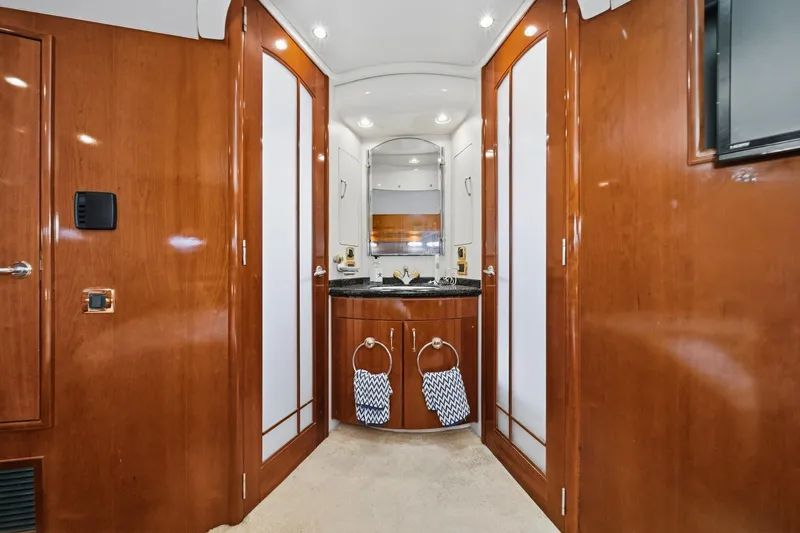 Slide: The Image of Luxurious interior of 2003 Carver 530 Voyager Pilothouse with elegant wood finishes and modern amenities. - 62