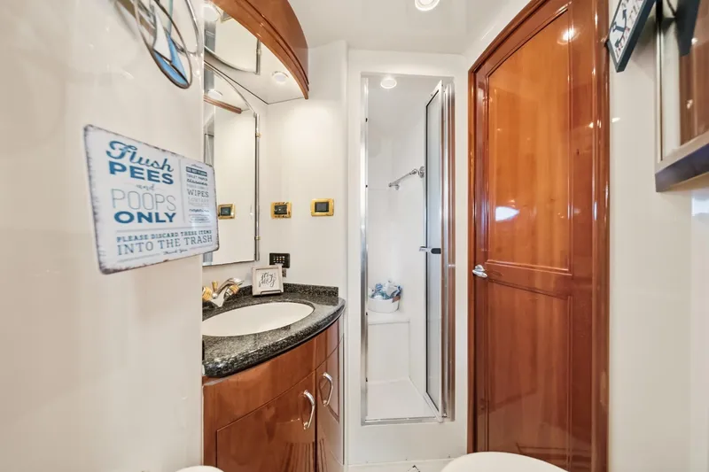 Slide: The Image of Luxurious bathroom in 2003 Carver 530 Voyager Pilothouse yacht with modern amenities. - 67