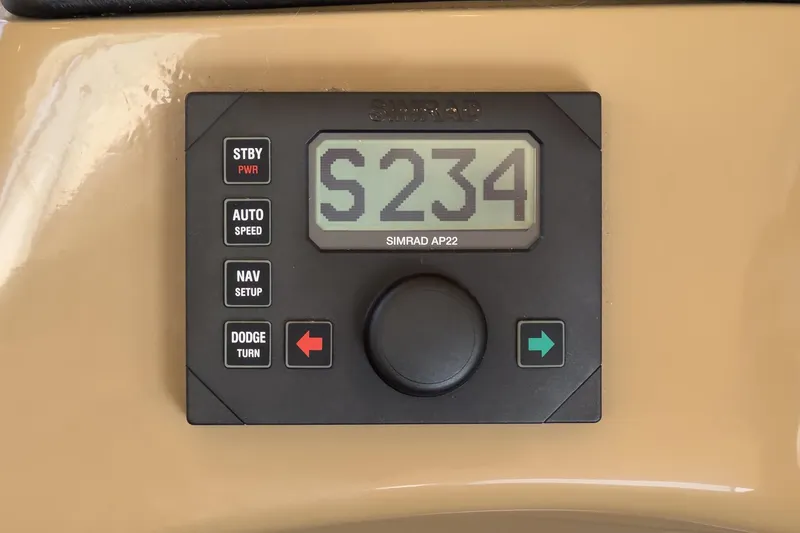 Slide: The Image of Simrad AP22 autopilot control panel on 2003 Carver 530 Voyager Pilothouse. - 73
