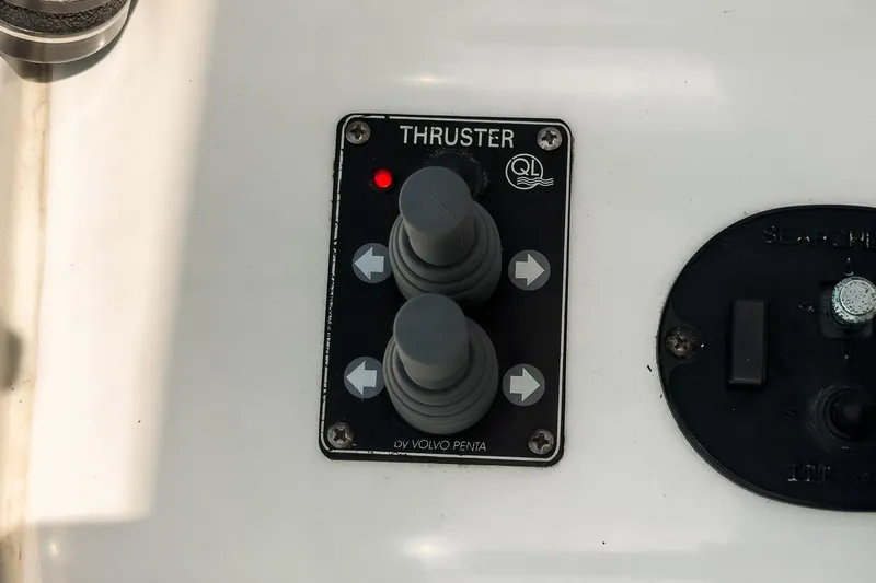 Slide: The Image of Control panel for thrusters on a 2003 Carver 530 Voyager Pilothouse yacht. - 75