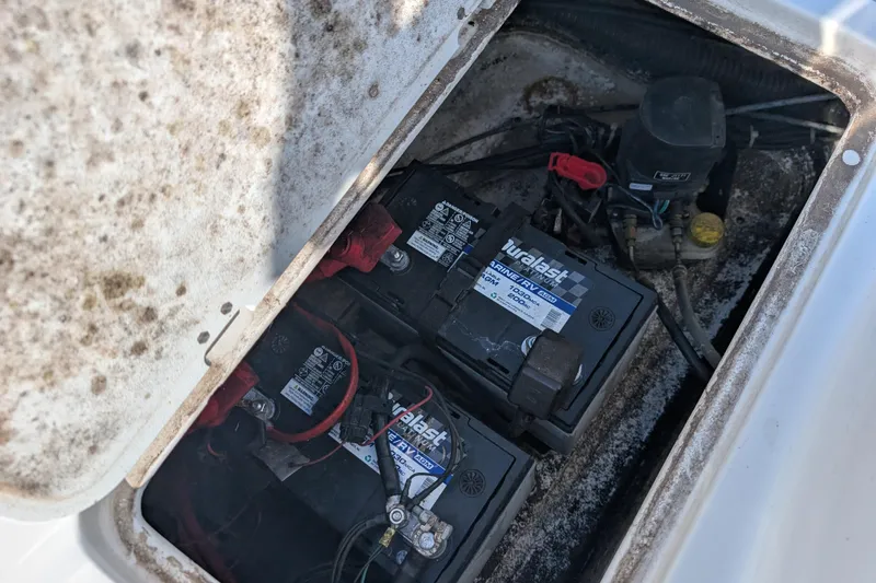 Slide: The Image of Battery compartment of a 2017 Hurricane SunDeck Sport 202 IO boat. - 14