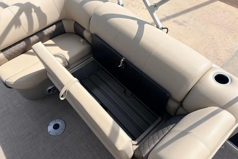 Slide: The Image of 2025 Sun Tracker SportFish 20 DLX boat seat with storage compartment and cup holder. - 25