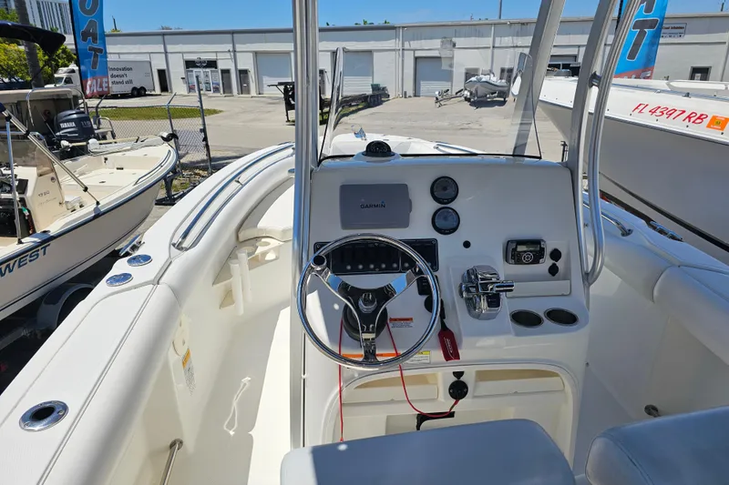Slide: The Image of Control panel of a 2012 Boston Whaler 220 Outrage with Garmin navigation system. - 17