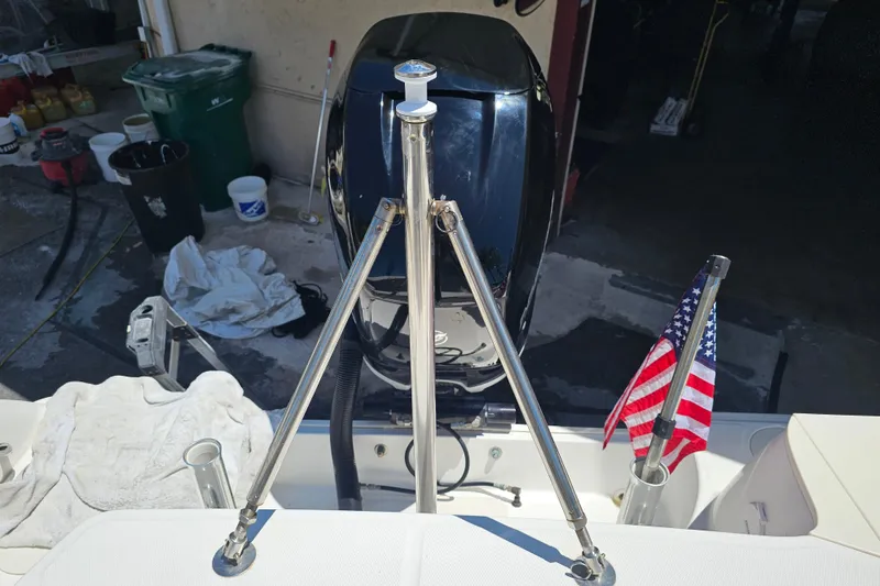 Slide: The Image of Open storage compartment on a 2012 Boston Whaler 220 Outrage boat. - 30