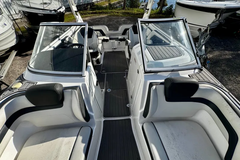 Slide: The Image of 2019 Yamaha Boats 242 Limited S interior with sleek seating and modern design. - 4