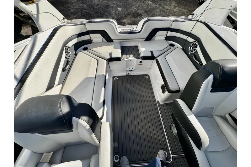 Slide: The Image of 2019 Yamaha Boats 242 Limited S interior with sleek seating and modern design. - 7