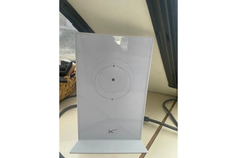 Slide: The Image of Starlink satellite dish inside a 1986 Hi-Star 40 Flybridge boat cabin. - 20