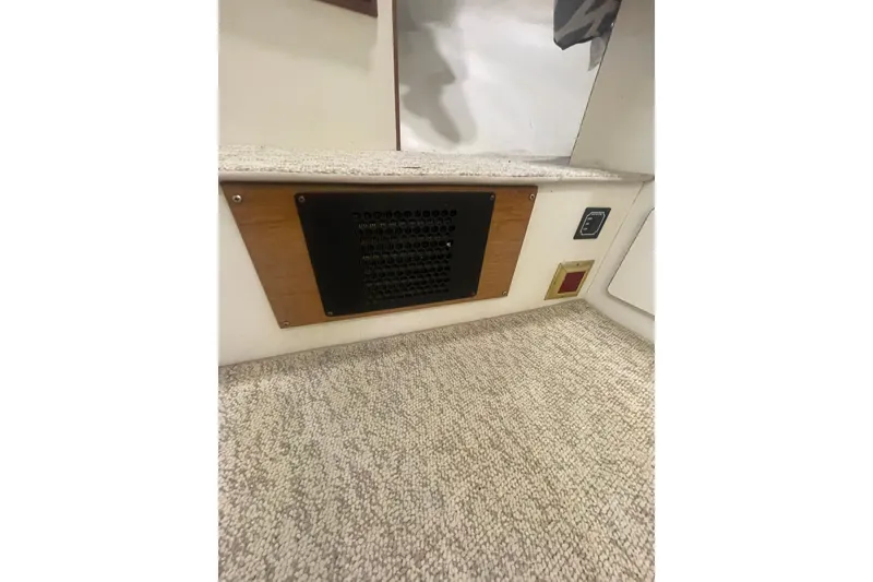Slide: The Image of Interior detail of 1986 Hi-Star 40 Flybridge, featuring carpeted flooring and wall panel. - 31