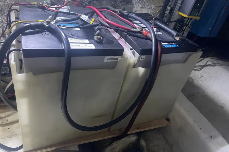 Slide: The Image of Battery setup in 1986 Hi-Star 40 Flybridge boat engine room. - 37