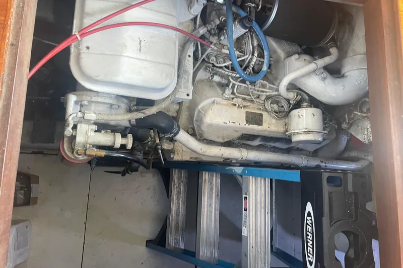 Slide: The Image of Engine compartment of a 1986 Hi-Star 40 Flybridge boat, showcasing mechanical components. - 40