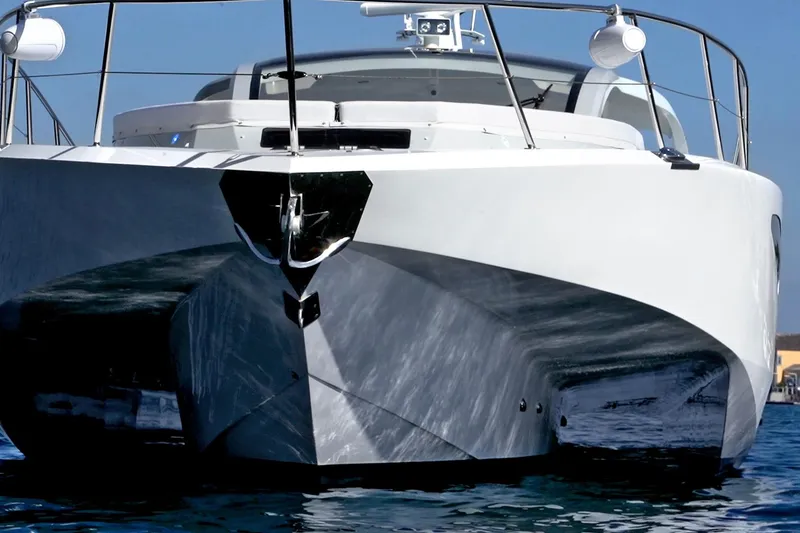 Slide: The Image of 2017 Tritons Express Cruiser Crossover on water, showcasing sleek design and modern features. - 5
