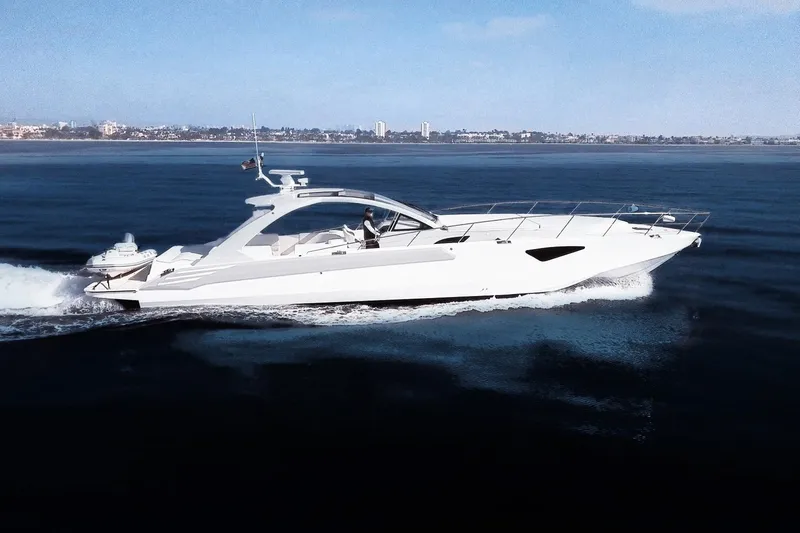 Slide: The Image of 2017 Tritons Express Cruiser Crossover yacht cruising on open water. - 6
