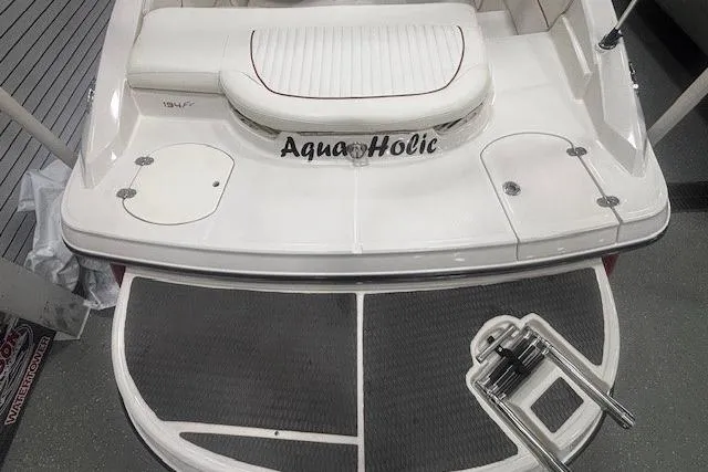 Slide: The Image of 2008 Monterey 194FS boat with "AquaHolic" name on the rear deck. - 14