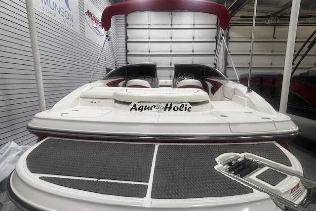 Slide: The Image of 2008 Monterey 194FS boat with "Aqua Holic" text, displayed indoors. - 20