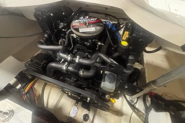 Slide: The Image of Engine compartment of a 2008 Monterey 194FS boat with a 4.3 Mercury engine. - 22