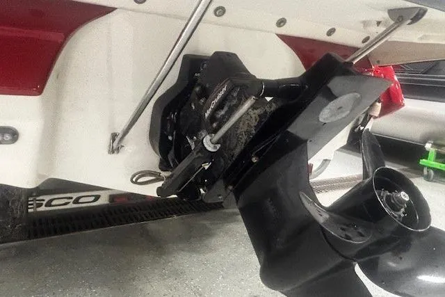 Slide: The Image of 2008 Monterey 194FS boat outboard motor close-up in a garage setting. - 26