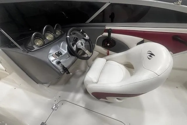 Slide: The Image of 2008 Monterey 194FS boat interior with steering wheel and gauges. - 9