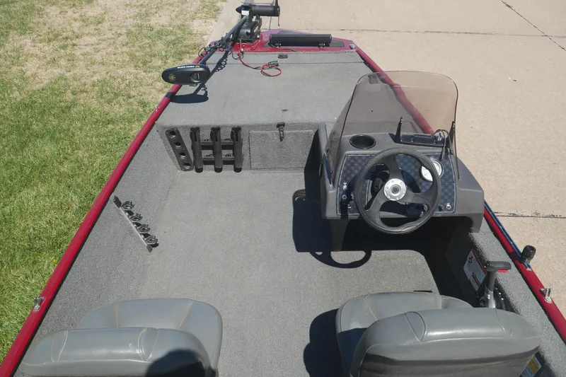 Slide: The Image of 2022 Tracker Bass Tracker Classic XL boat interior with steering console and seating. - 5