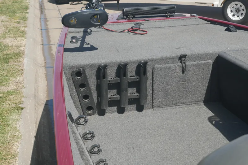 Slide: The Image of 2022 Tracker Bass Tracker Classic XL boat deck with rod holders and trolling motor. - 8