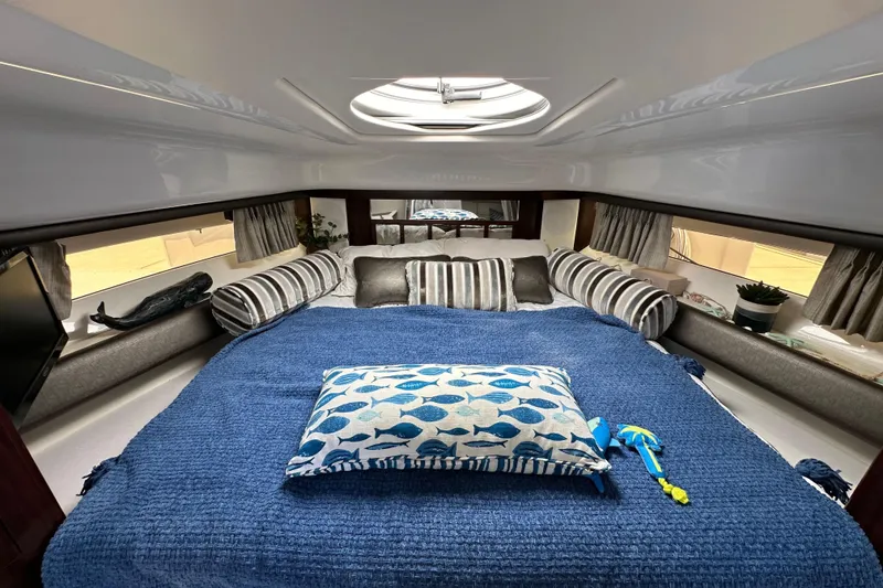 Slide: The Image of Luxurious interior of 2020 Monterey 355 Sport Yacht with cozy bedding and stylish decor. - 43