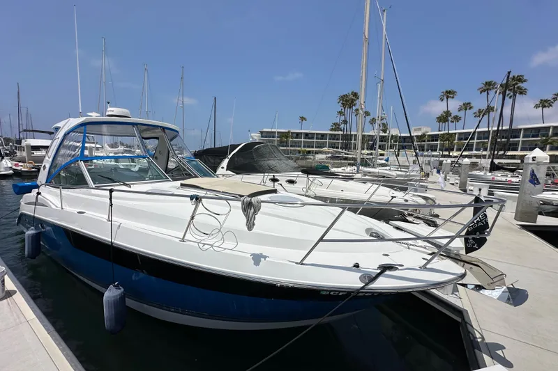 Slide: The Image of 2020 Monterey 355 Sport Yacht docked at a marina under a clear blue sky. - 5