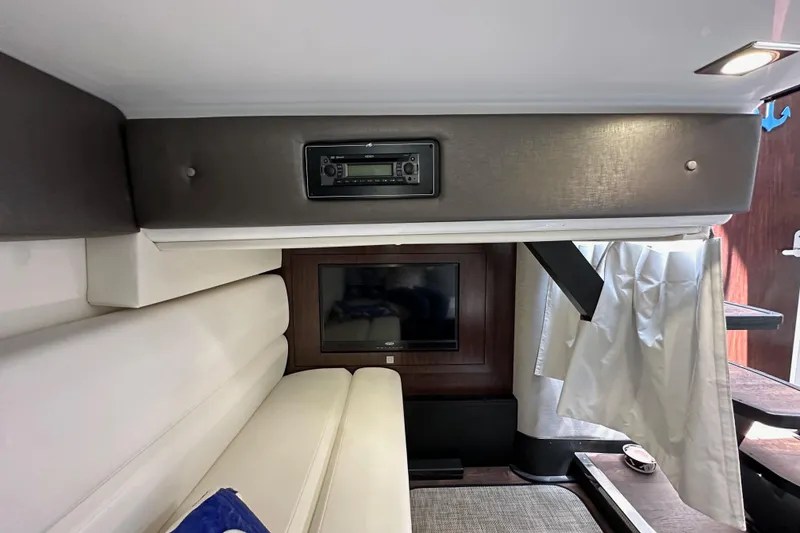 Slide: The Image of Interior of 2020 Monterey 355 Sport Yacht with TV and seating area. - 51