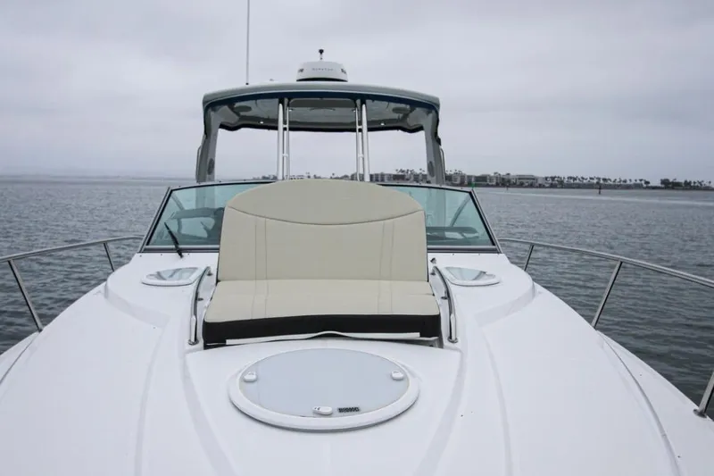 Slide: The Image of 2020 Monterey 355 Sport Yacht on calm waters, featuring sleek design and comfortable seating. - 67