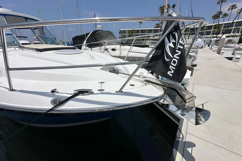 Slide: The Image of 2020 Monterey 355 Sport Yacht docked, showcasing sleek design and modern features. - 7