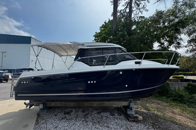 Slide: The Image of 2019 Jeanneau NC 795 boat on display, featuring sleek design and modern amenities. - 19