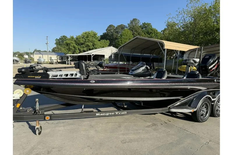 The Image of 2016 Ranger Z521 Comanche bass boat on trailer in outdoor setting. - 0