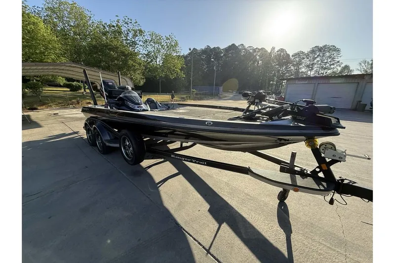 Slide: The Image of 2016 Ranger Z521 Comanche boat on trailer in sunny outdoor setting. - 6