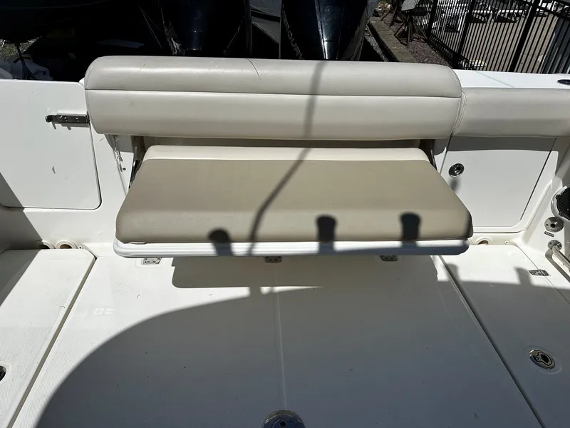 Slide: The Image of Foldable bench seat on a 2019 Boston Whaler 330 Outrage boat. - 12