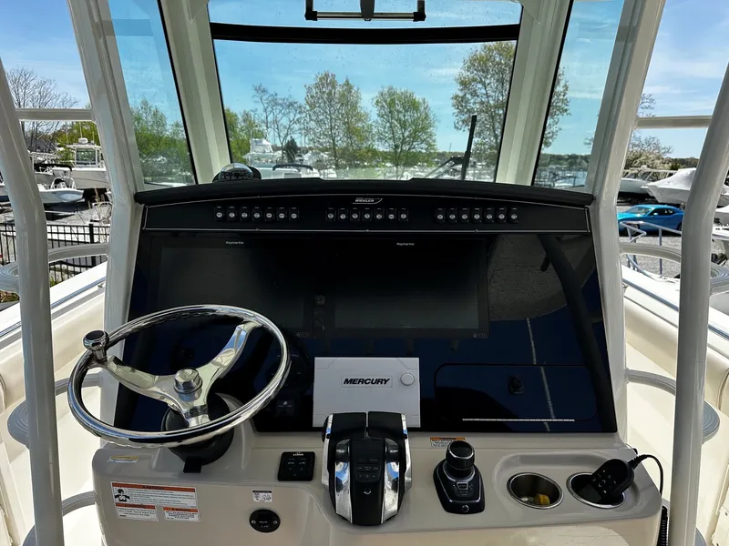Slide: The Image of Helm console of a 2019 Boston Whaler 330 Outrage boat. - 22