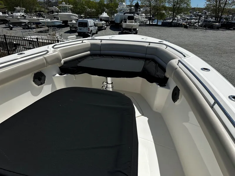 Slide: The Image of 2019 Boston Whaler 330 Outrage, bow view at marina. - 31