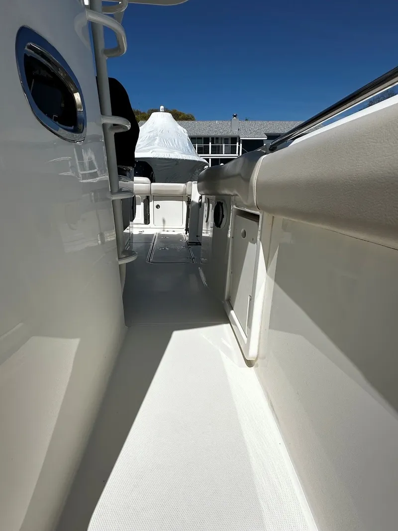 Slide: The Image of Interior view of a 2019 Boston Whaler 330 Outrage boat. - 34
