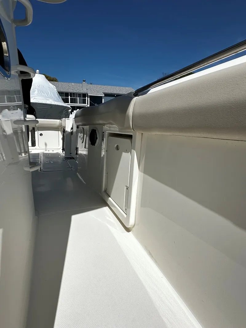 Slide: The Image of Interior view of a 2019 Boston Whaler 330 Outrage boat deck. - 35