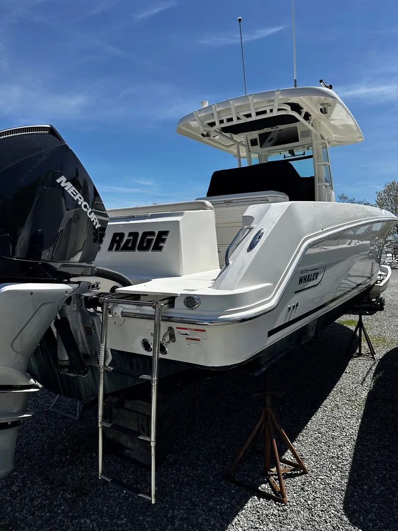 Slide: The Image of 2019 Boston Whaler 330 Outrage boat with Mercury engine. - 4