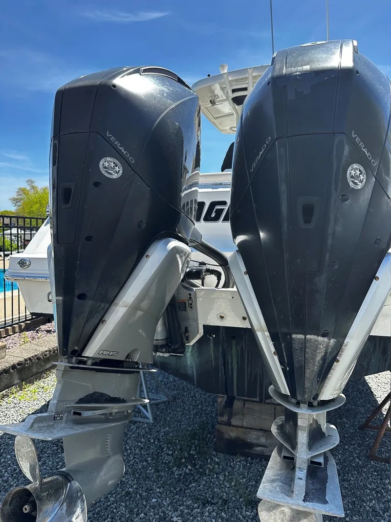 Slide: The Image of 2019 Boston Whaler 330 Outrage with dual outboard engines. - 5