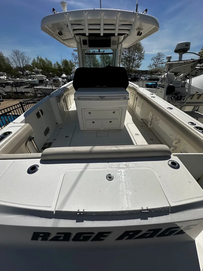 Slide: The Image of Interior view of a 2019 Boston Whaler 330 Outrage boat in harbor. - 6