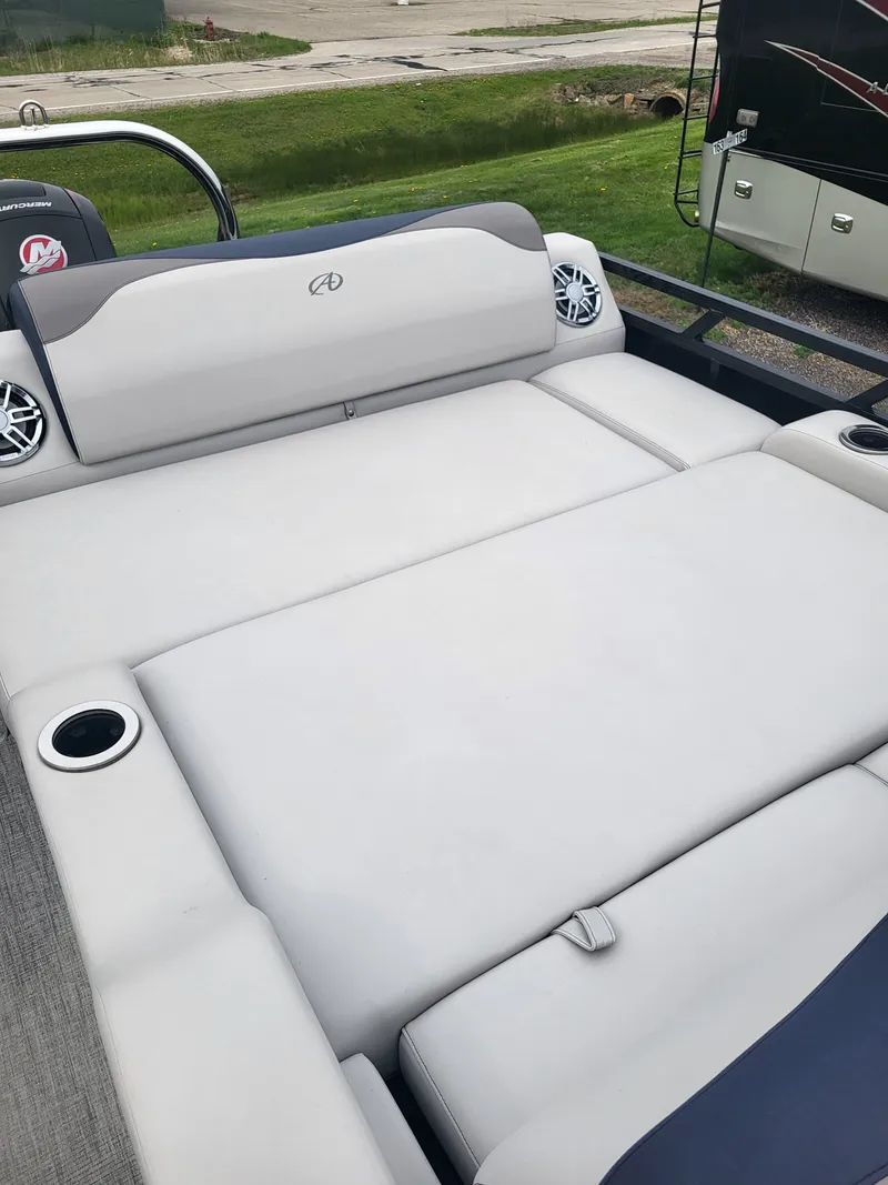 Slide: The Image of 2023 Avalon 2385 LSZ boat with luxurious lounging area. - 14