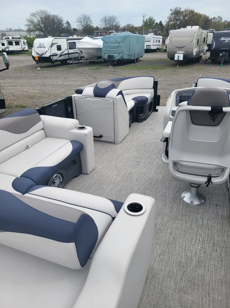 Slide: The Image of Interior of a 2023 Avalon 2385 LSZ pontoon boat with luxurious seating. - 15