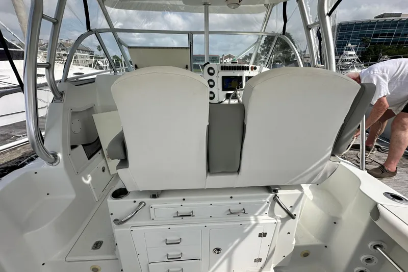 Slide: The Image of 2007 Polar 2700 Walkaround boat interior with helm and seating area. - 28