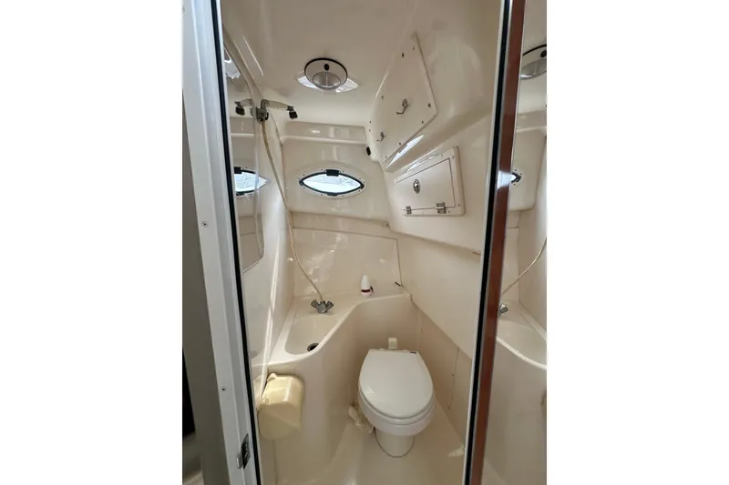 Slide: The Image of 2007 Polar 2700 Walkaround boat bathroom with compact design and modern fixtures. - 46